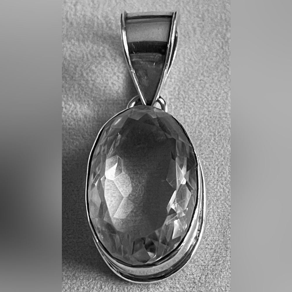 SILVER ROCK CRYSTAL PENDANT/CLEAR FACETED SET IN 925 SILVER /MARKED/ 2”l x 3/4”